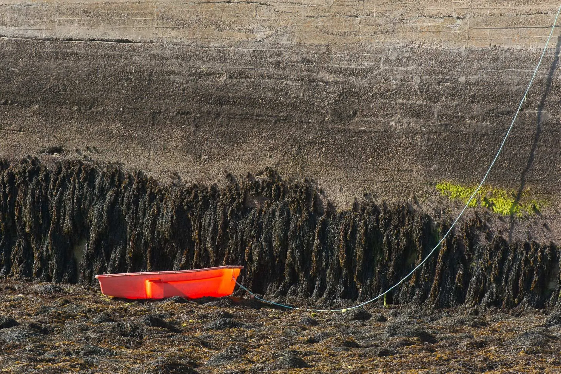 A tide gauge logs the water level at the port every six minutes for at least a full year.